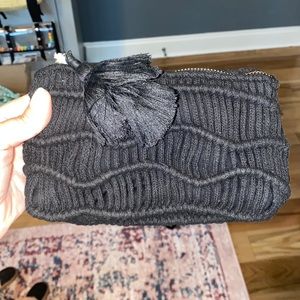 Small pouch with tassel zipper pull